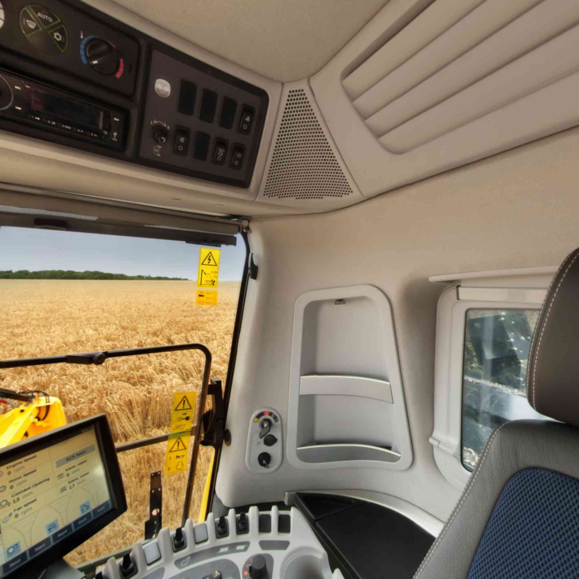 Interior cladding for harvesting machine